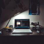 laptop for video editing under 40000 india - macbook pro on black table