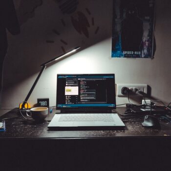 laptop for video editing under 40000 india - macbook pro on black table