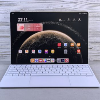 laptop price under 10000 - A modern tablet with a white keyboard attachment.