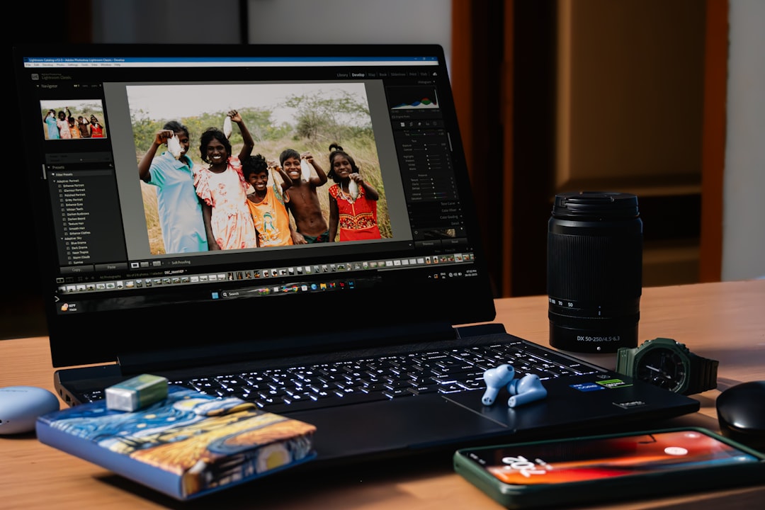ssd vs hdd laptop india - A laptop computer sitting on top of a wooden desk