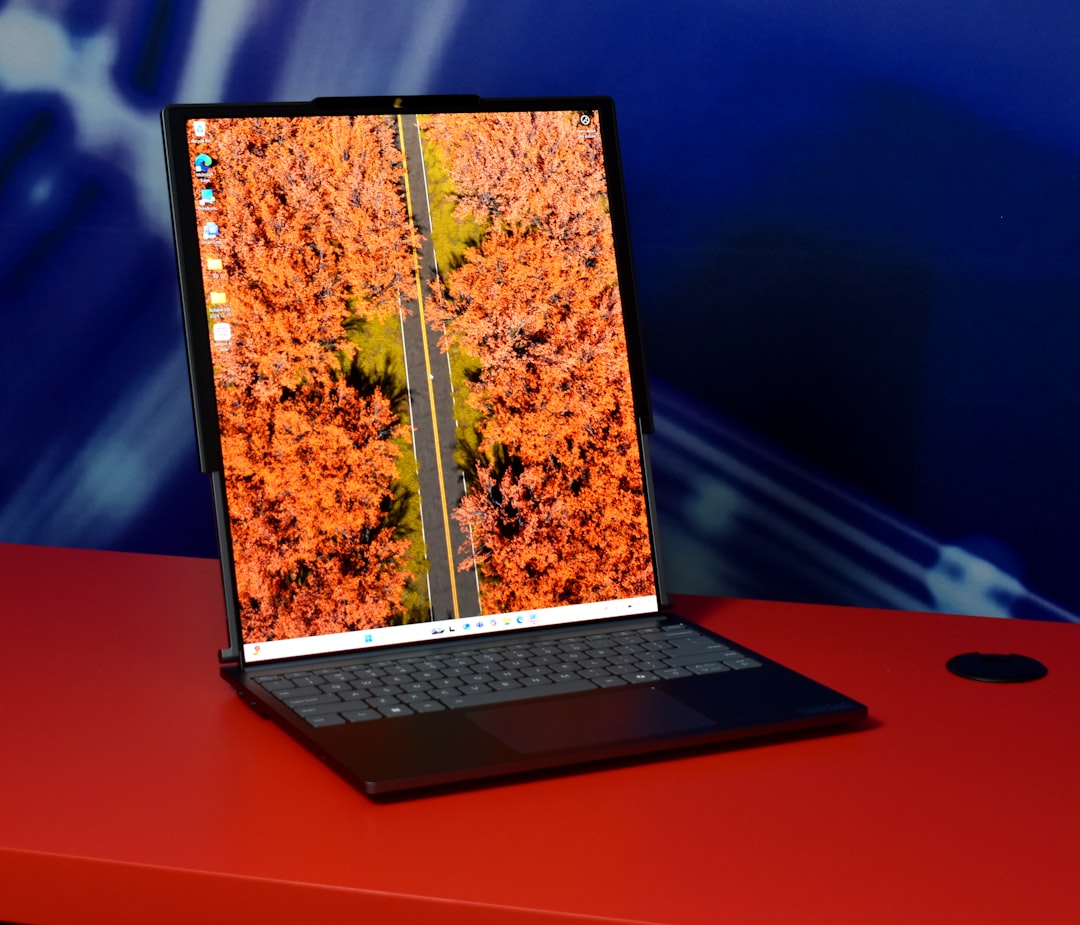 lenovo thinkpad t14s - Laptop displaying autumn trees and road