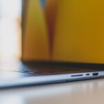 refurbished laptop - a close up of a laptop on a table