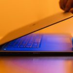 a person using a laptop computer on a desk